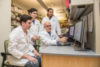 Dr Reshef instructs his lab members